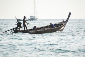 Three men in a boat